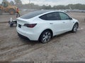 2021 Tesla Model Y — photo 4 of 15 | VIN 5YJYGDEE4MF295590