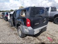 2012 Nissan Xterra — photo 3 of 12 | VIN 5N1AN0NU3CC503313