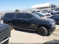 2017 Chevrolet Suburban — photo 13 of 16 | VIN 1GNSCHKCXHR241097