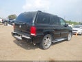 2003 Cadillac Escalade — photo 4 of 12 | VIN 1GYEC63T03R165448