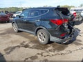 2017 Hyundai Santa Fe — photo 3 of 15 | VIN 5XYZTDLB8HG405337