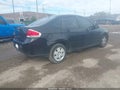 2008 Ford Focus — photo 4 of 16 | VIN 1FAHP34N28W285921