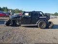 2018 Jeep Wrangler Unlimited — photo 14 of 16 | VIN 1C4HJXEN4JW283241
