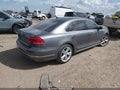 2013 Volkswagen Passat — photo 4 of 16 | VIN 1VWCM7A34DC106889