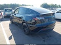 2022 Tesla Model Y — photo 3 of 15 | VIN 7SAYGDEE2NF426472