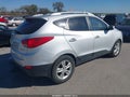 2011 Hyundai Tucson — photo 4 of 11 | VIN KM8JUCAC7BU136264