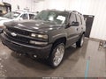 2004 Chevrolet Tahoe — photo 2 of 17 | VIN 1GNEK13Z74R161700