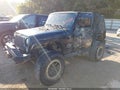 2010 Jeep Wrangler — photo 2 of 16 | VIN 1J4AA2D10AL103946