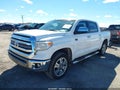 2016 Toyota Tundra — photo 2 of 16 | VIN 5TFAW5F18GX562195