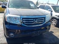 2013 Honda Pilot — photo 13 of 17 | VIN 5FNYF3H4XDB033668