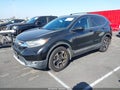 2017 Honda CR-V — photo 2 of 17 | VIN 5J6RW1H9XHL001210