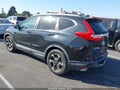 2017 Honda CR-V — photo 3 of 17 | VIN 5J6RW1H9XHL001210