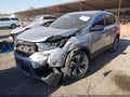 2018 Honda CR-V — photo 2 of 16 | VIN 2HKRW6H32JH205167