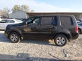 2013 Honda Pilot — photo 15 of 17 | VIN 5FNYF4H25DB024610
