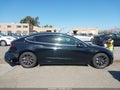 2018 Tesla Model 3 — photo 13 of 16 | VIN 5YJ3E1EA6JF157055
