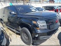 2015 Chevrolet Suburban 1500 — photo 14 of 22 | VIN 1GNSCHKCXFR281726