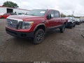2016 Nissan Titan — photo 2 of 16 | VIN 1N6BA1F43GN501898