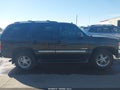 2005 GMC Yukon — photo 14 of 18 | VIN 1GKEK13T75J256590