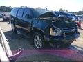 2012 Chevrolet Suburban 1500 — photo 1 of 16 | VIN 1GNSKJE77CR327226