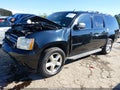 2012 Chevrolet Suburban 1500 — photo 2 of 16 | VIN 1GNSKJE77CR327226