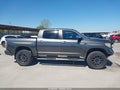 2014 Toyota Tundra — photo 13 of 16 | VIN 5TFAW5F19EX328340