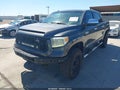 2014 Toyota Tundra — photo 2 of 16 | VIN 5TFAW5F19EX328340