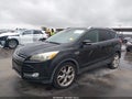 2014 Ford Escape — photo 2 of 18 | VIN 1FMCU0J90EUB00397