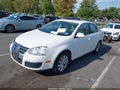 2010 Volkswagen Jetta — photo 2 of 11 | VIN 3VWRX7AJ6AM033809