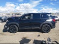 2023 Honda Passport — photo 13 of 15 | VIN 5FNYF8H52PB040642