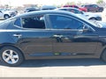 2015 Kia Optima — photo 12 of 15 | VIN 5XXGM4A74FG462784