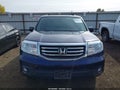 2014 Honda Pilot — photo 13 of 17 | VIN 5FNYF4H47EB011246