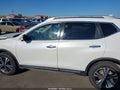 2017 Nissan Rogue — photo 14 of 16 | VIN JN8AT2MV8HW270037