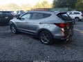 2017 Hyundai Santa Fe — photo 3 of 16 | VIN 5XYZU3LB7HG427174