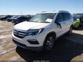 2017 Honda Pilot — photo 2 of 18 | VIN 5FNYF6H95HB093196