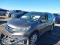 2016 Honda CR-V — photo 2 of 16 | VIN 2HKRM3H7XGH548728