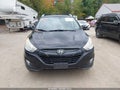 2013 Hyundai Tucson — photo 13 of 15 | VIN KM8JUCAC6DU670388
