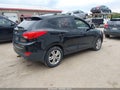 2013 Hyundai Tucson — photo 4 of 15 | VIN KM8JUCAC6DU670388