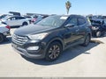 2014 Hyundai Santa Fe — photo 2 of 16 | VIN 5XYZU3LB7EG186700