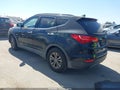2014 Hyundai Santa Fe — photo 3 of 16 | VIN 5XYZU3LB7EG186700