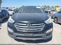 2014 Hyundai Santa Fe — photo 6 of 16 | VIN 5XYZU3LB7EG186700