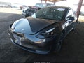 2023 Tesla Model 3 — photo 2 of 15 | VIN 5YJ3E1EA0PF473897