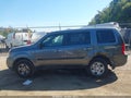 2013 Honda Pilot — photo 14 of 16 | VIN 5FNYF4H20DB028466