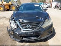 2017 Nissan Altima — photo 12 of 16 | VIN 1N4AL3AP0HC232851