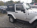 2009 Jeep Wrangler — photo 14 of 17 | VIN 1J8FA54169L761613