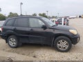 2002 Toyota RAV4 — photo 13 of 17 | VIN JTEGH20V520042158
