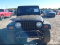 2004 Jeep Wrangler — photo 12 of 16 | VIN 1J4FA69S14P706982
