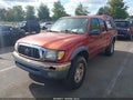 2002 Toyota Tacoma — photo 2 of 13 | VIN 5TEWM72N92Z023554