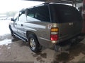 2003 Chevrolet Suburban 1500 — photo 3 of 16 | VIN 1GNEC16ZX3J112898