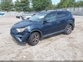 2018 Toyota RAV4 — photo 2 of 15 | VIN 2T3RFREV5JW805424