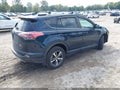 2018 Toyota RAV4 — photo 4 of 15 | VIN 2T3RFREV5JW805424
